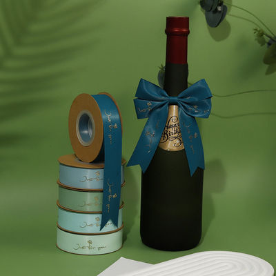 Ruban de satin en polyéther imprimé en feuille d'or sur mesure pour l'emballage de cadeaux
