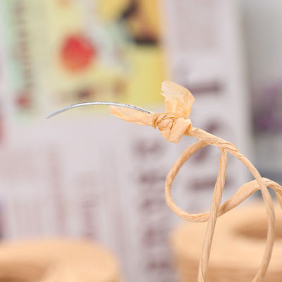 Corde de raffia tordue de couleur beige de 150 m de longueur