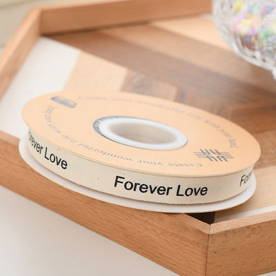 13 mm en gros Logo Ruban de coton Style littéraire Emballage de fleurs Boîte cadeau Décoration Ruban Bouquet de gâteau